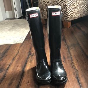 Tall black hunter rain boots